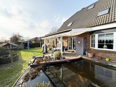 TOP GEPFLEGT UND LAUFEND MODERNISIERT MIT KWK - Doppelhaushälfte Wiemersdorf | Angebot:26055913